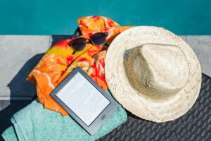 spring break essentials next to a pool