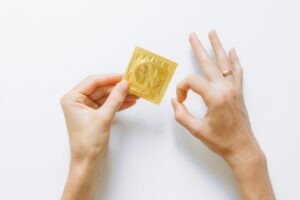 condoms prevent pregnancy via the barrier method